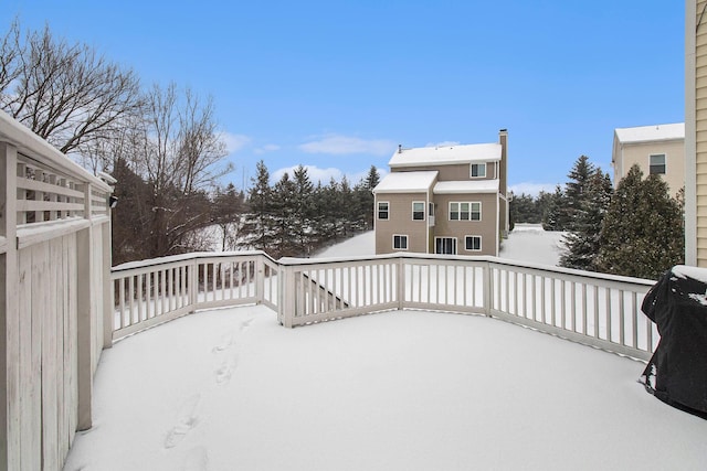 view of snow covered deck