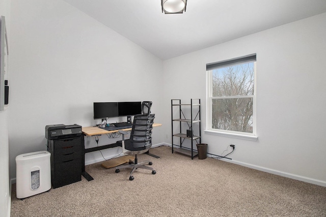 office featuring lofted ceiling, carpet flooring, and baseboards