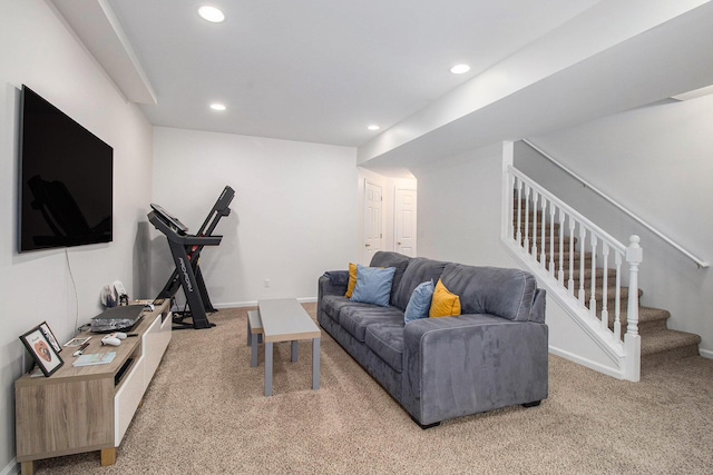 carpeted living area featuring stairs, baseboards, and recessed lighting