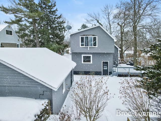 view of snow covered house