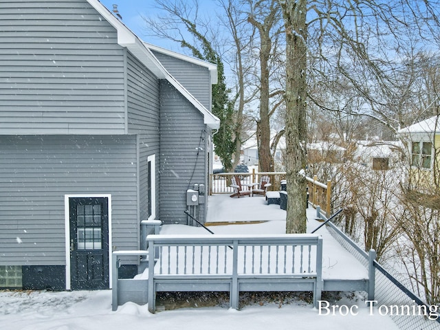 view of snow covered deck