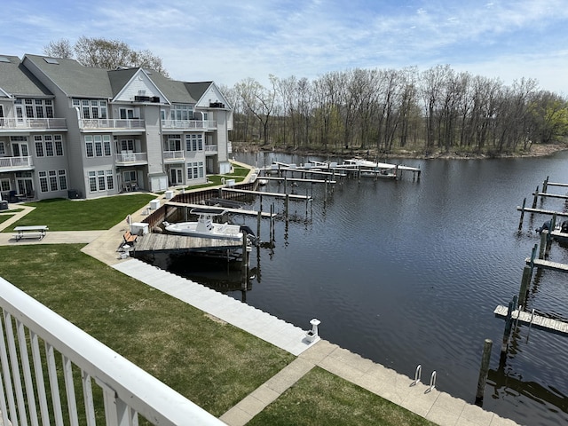 2411 Lake Ave Unit 36, Muskegon, MI 49445 - view of dock with a water view, a yard, and boat lift