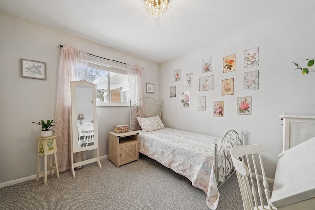 bedroom featuring carpet flooring and baseboards