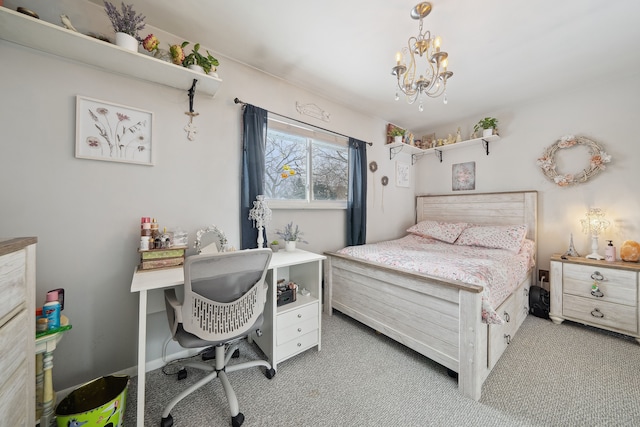 bedroom featuring carpet and a chandelier