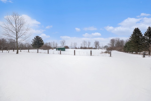 view of yard layered in snow