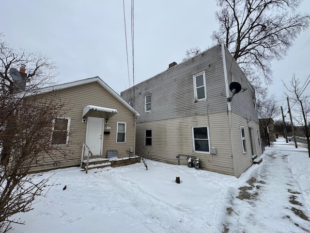 view of snow covered property