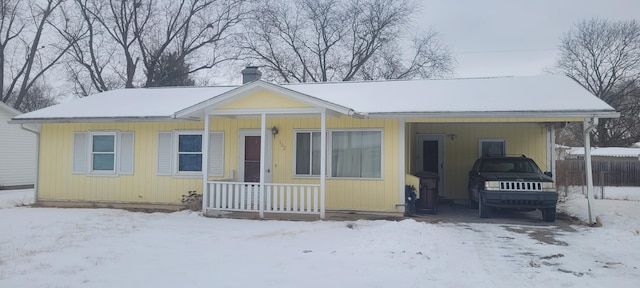 view of front of property featuring a chimney