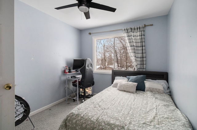 2839 Davista Dr, Highland, MI 48356 - bedroom with carpet flooring, baseboards, ceiling fan, and a desk
