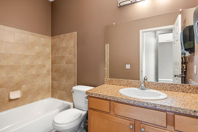 full bathroom with washtub / shower combination, vanity, and toilet