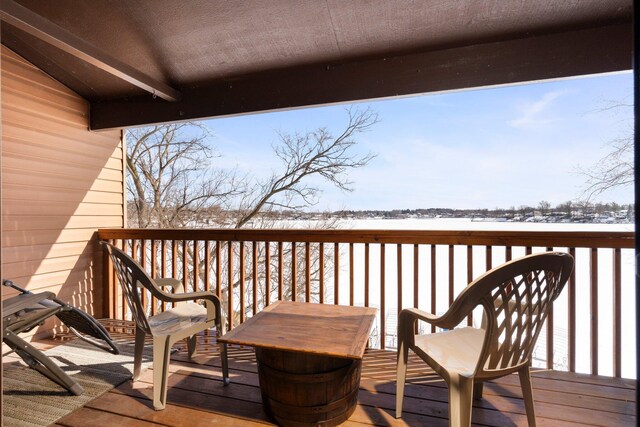 view of snow covered deck