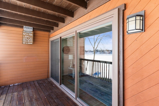 view of snow covered deck