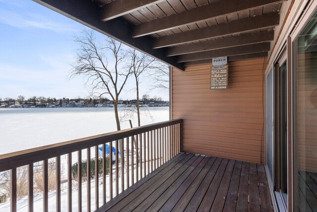 view of snow covered deck