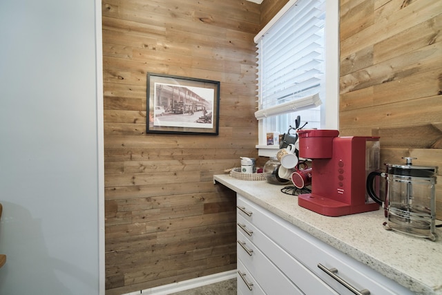 bar featuring wooden walls