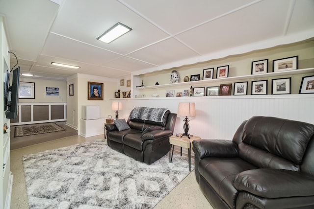 living area with speckled floor