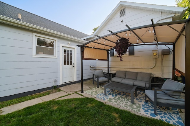 view of patio featuring a gazebo and an outdoor living space