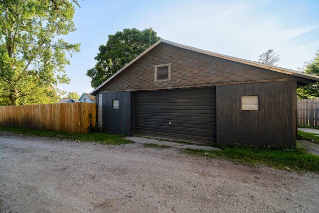 detached garage with fence