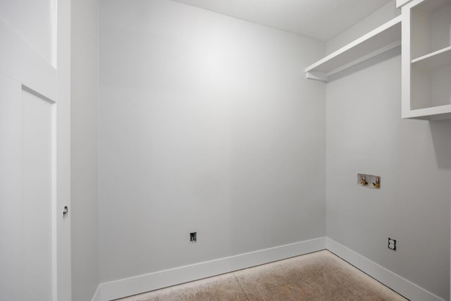 laundry room featuring hookup for a washing machine, laundry area, and baseboards