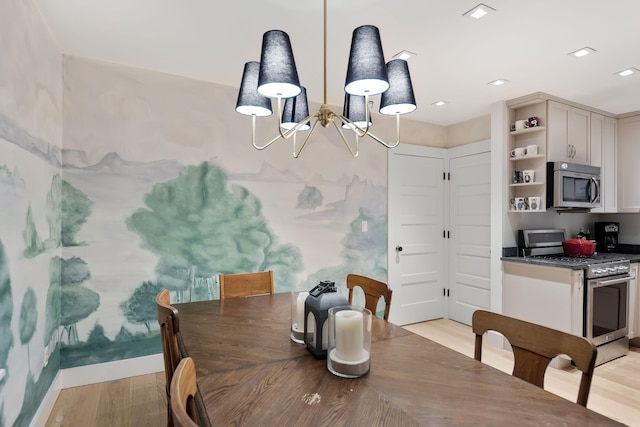 dining space with light wood-type flooring and recessed lighting