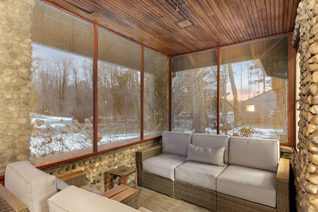 unfurnished sunroom with wooden ceiling