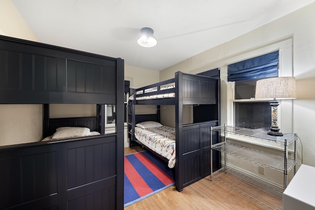 bedroom featuring wood finished floors