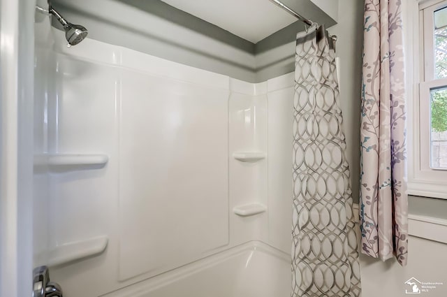 full bathroom featuring shower / bath combination with curtain