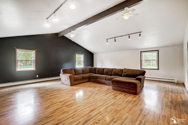 living room featuring a baseboard heating unit, light wood-style floors, lofted ceiling with beams, and baseboard heating