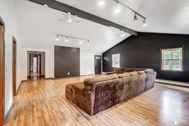 living area featuring ceiling fan, lofted ceiling with beams, a baseboard radiator, baseboards, and light wood-style floors