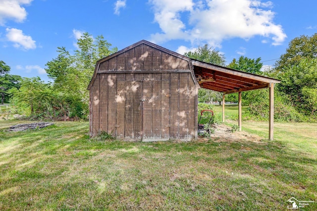 view of shed with a carport