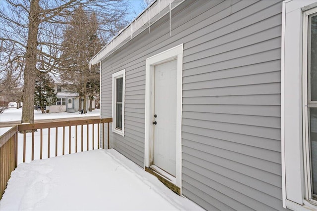 view of snow covered deck