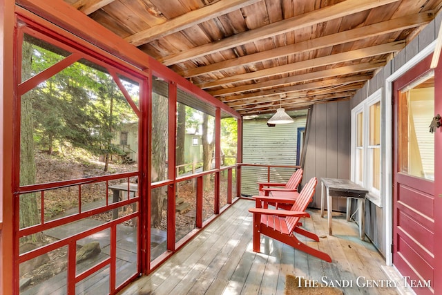 sunroom / solarium with wood ceiling and beamed ceiling