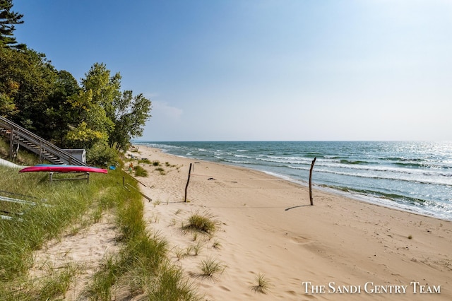 property view of water featuring a beach view