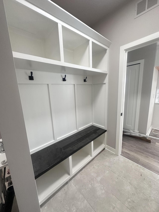 mudroom featuring visible vents and baseboards