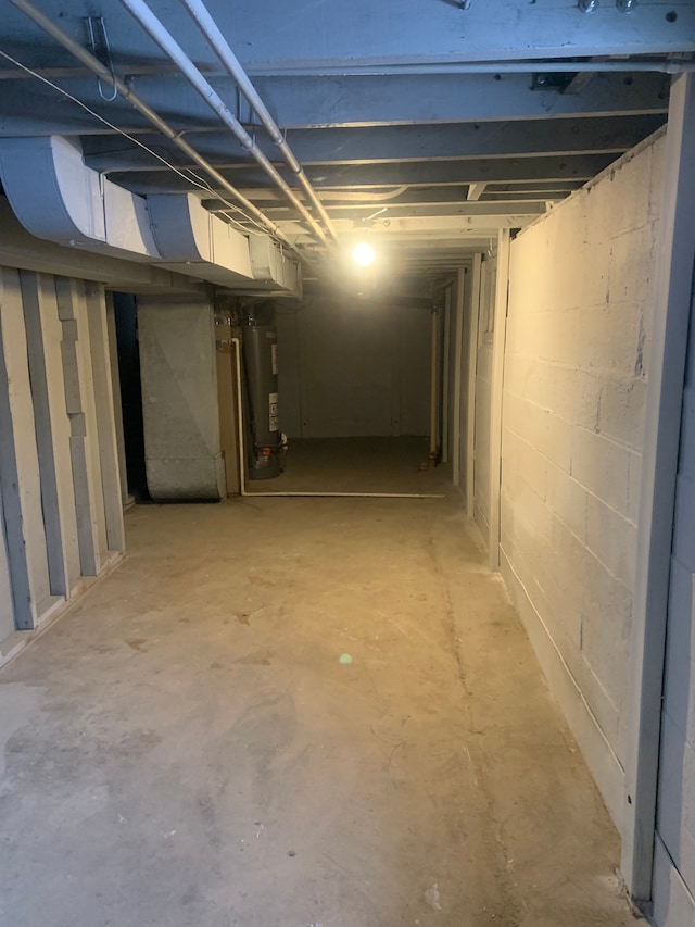 unfinished basement with water heater