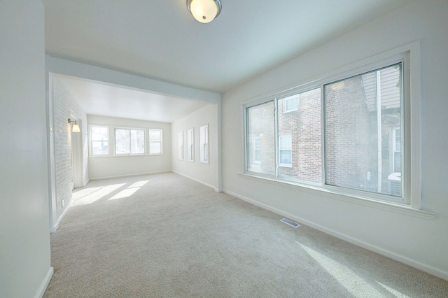 9543 W Outer Dr, Detroit, MI 48223 - unfurnished room featuring baseboards, carpet flooring, and visible vents