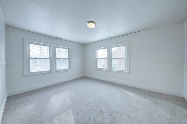 9543 W Outer Dr, Detroit, MI 48223 - spare room with carpet floors, visible vents, and baseboards
