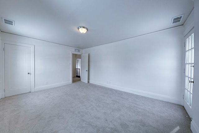 9543 W Outer Dr, Detroit, MI 48223 - carpeted spare room featuring baseboards and visible vents