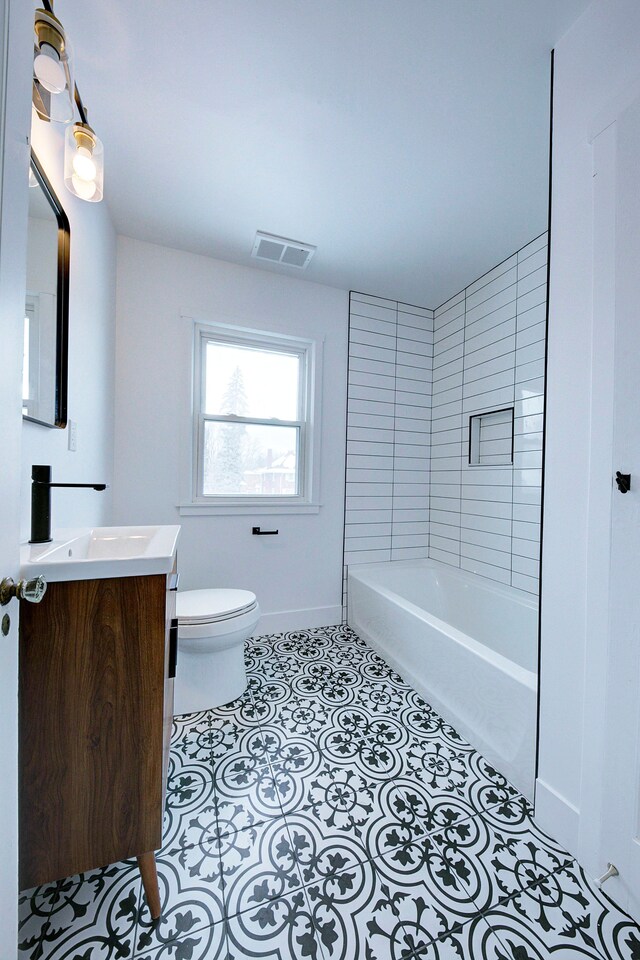 9543 W Outer Dr, Detroit, MI 48223 - full bathroom featuring vanity,  shower combination, baseboards, toilet, and visible vents