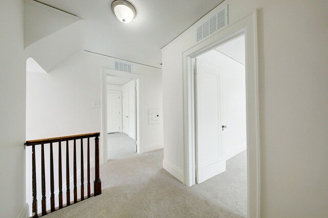 9543 W Outer Dr, Detroit, MI 48223 - corridor with baseboards, visible vents, and carpet