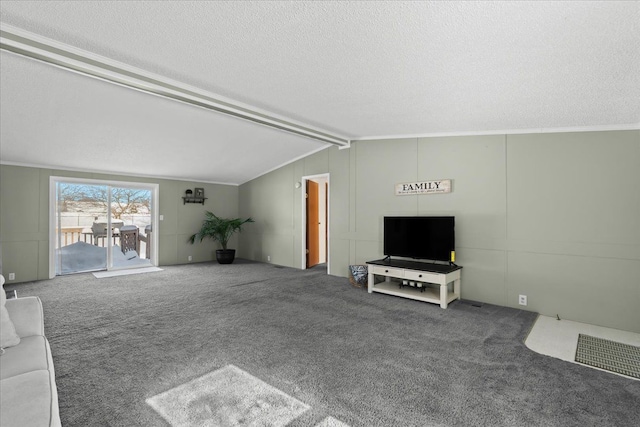 carpeted living room with lofted ceiling, ornamental molding, and a textured ceiling