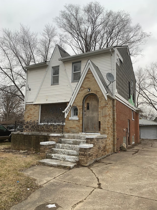 view of front of house with brick siding