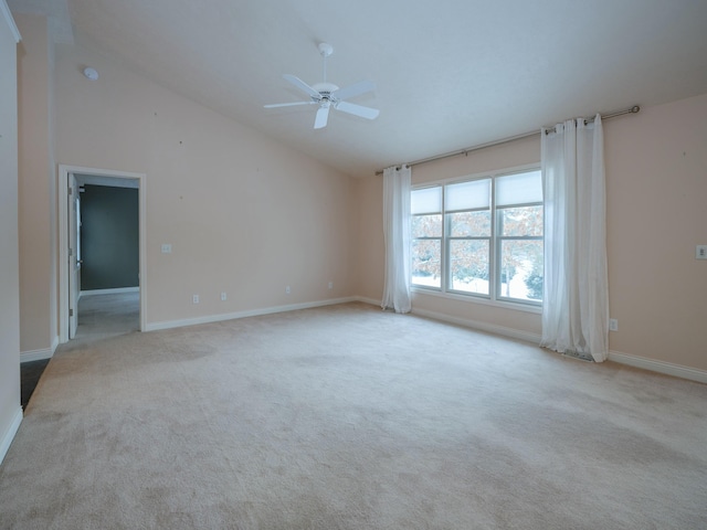 unfurnished room with baseboards, high vaulted ceiling, ceiling fan, and light colored carpet