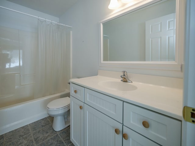 full bathroom featuring shower / tub combo, vanity, toilet, and tile patterned floors