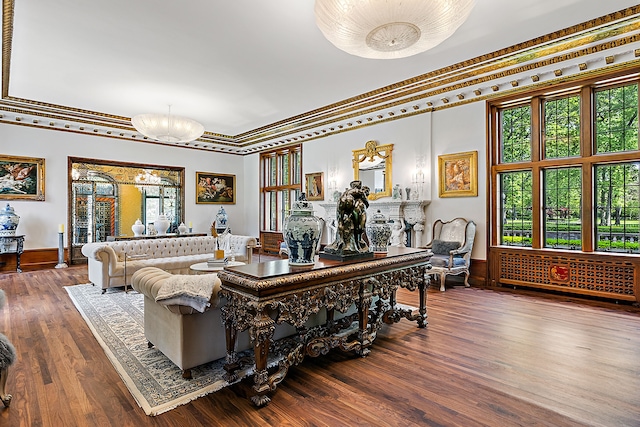 1771 Balmoral Dr, Detroit, MI 48203 - living area with a healthy amount of sunlight, wood finished floors, and ornamental molding