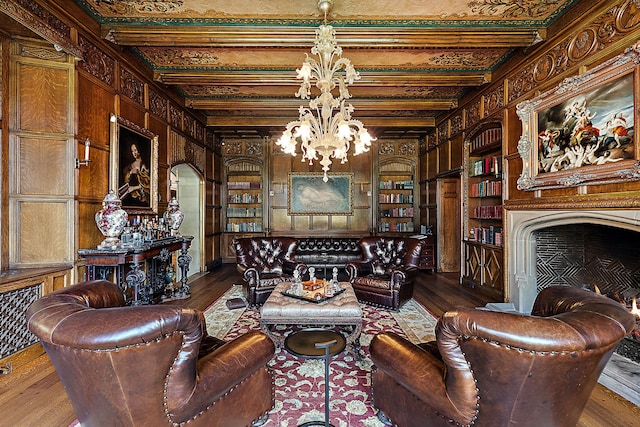 1771 Balmoral Dr, Detroit, MI 48203 - living area with hardwood / wood-style floors, a notable chandelier, built in features, and wood walls