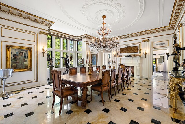 1771 Balmoral Dr, Detroit, MI 48203 - dining room with a tray ceiling, an inviting chandelier, crown molding, and a decorative wall
