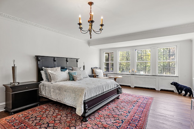 1771 Balmoral Dr, Detroit, MI 48203 - bedroom featuring wood finished floors, a chandelier, and ornamental molding
