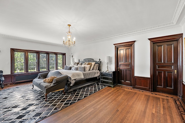 1771 Balmoral Dr, Detroit, MI 48203 - bedroom with crown molding, a notable chandelier, wood finished floors, and wainscoting