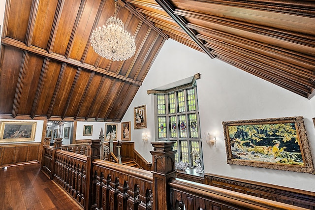 1771 Balmoral Dr, Detroit, MI 48203 - interior space with a wainscoted wall, lofted ceiling, an upstairs landing, an inviting chandelier, and dark wood-style floors