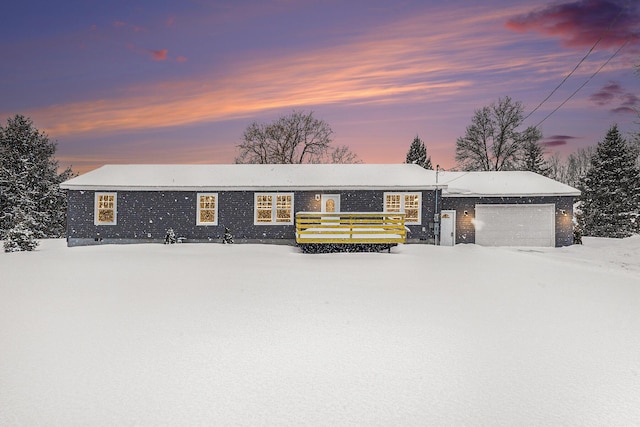 ranch-style home featuring a garage and crawl space