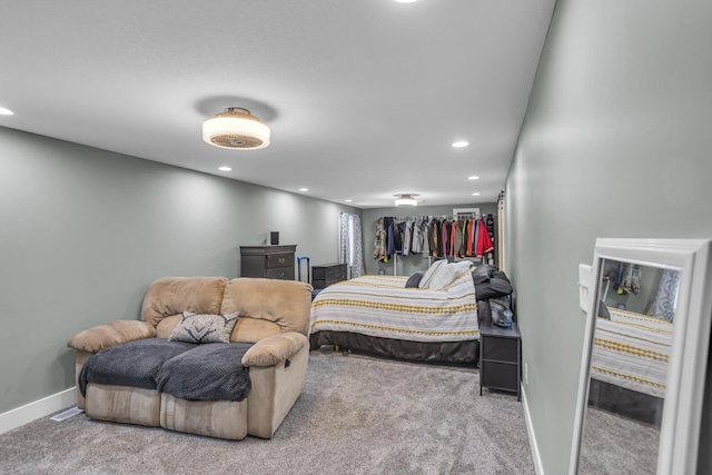 bedroom with carpet, baseboards, and recessed lighting